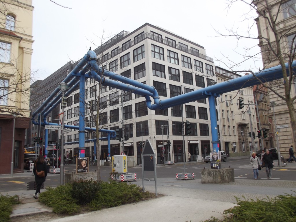 What are all these blue pipes around Unten den Linden? It appears that there is a branch of the pipe going into the ground under every building. Perhaps it is a district cooling system of some kind?
