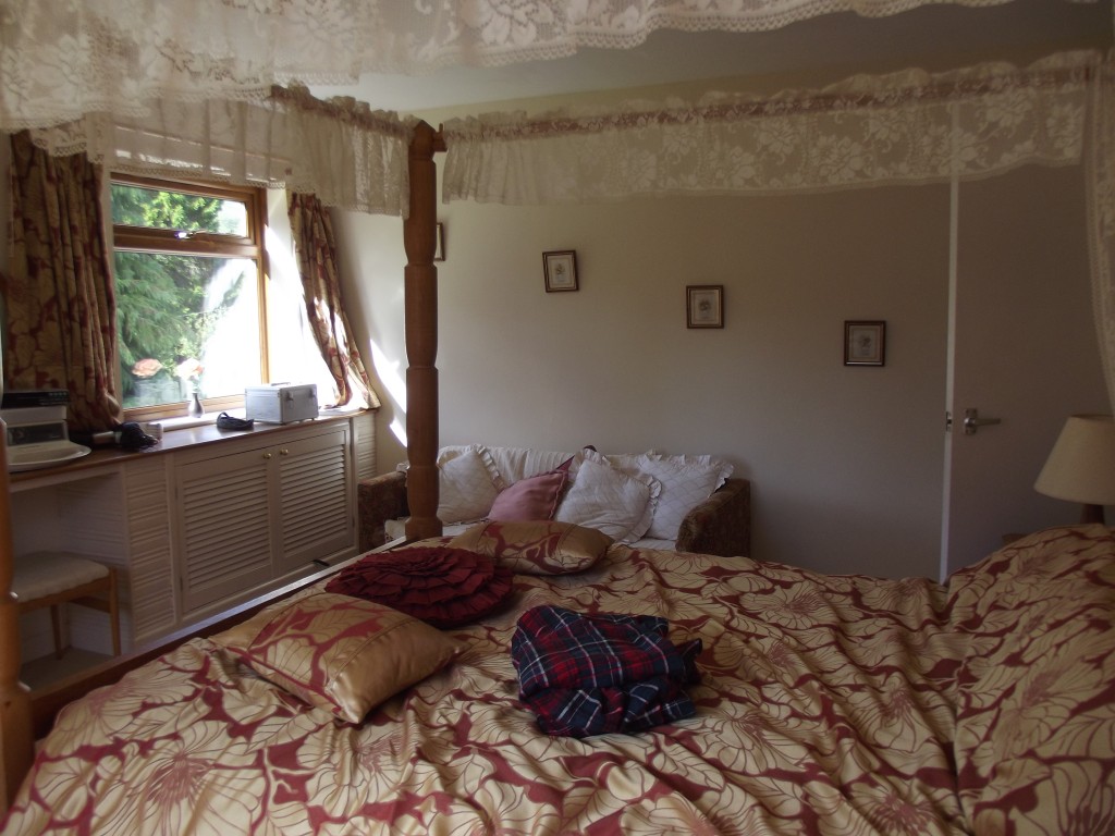 My bedroom - with the luxury of a four-poster bed!