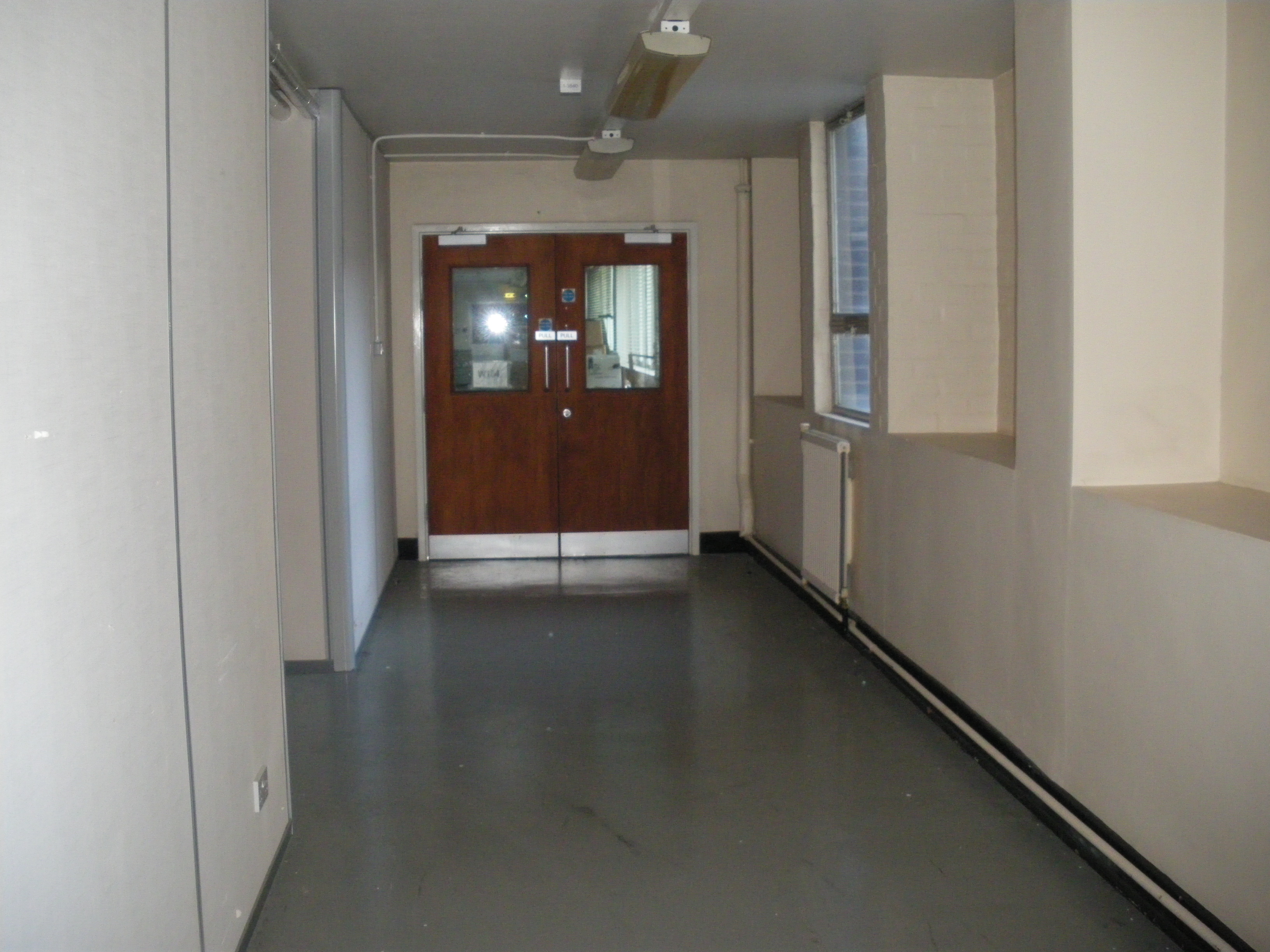 Corridor between F core lobby and W104