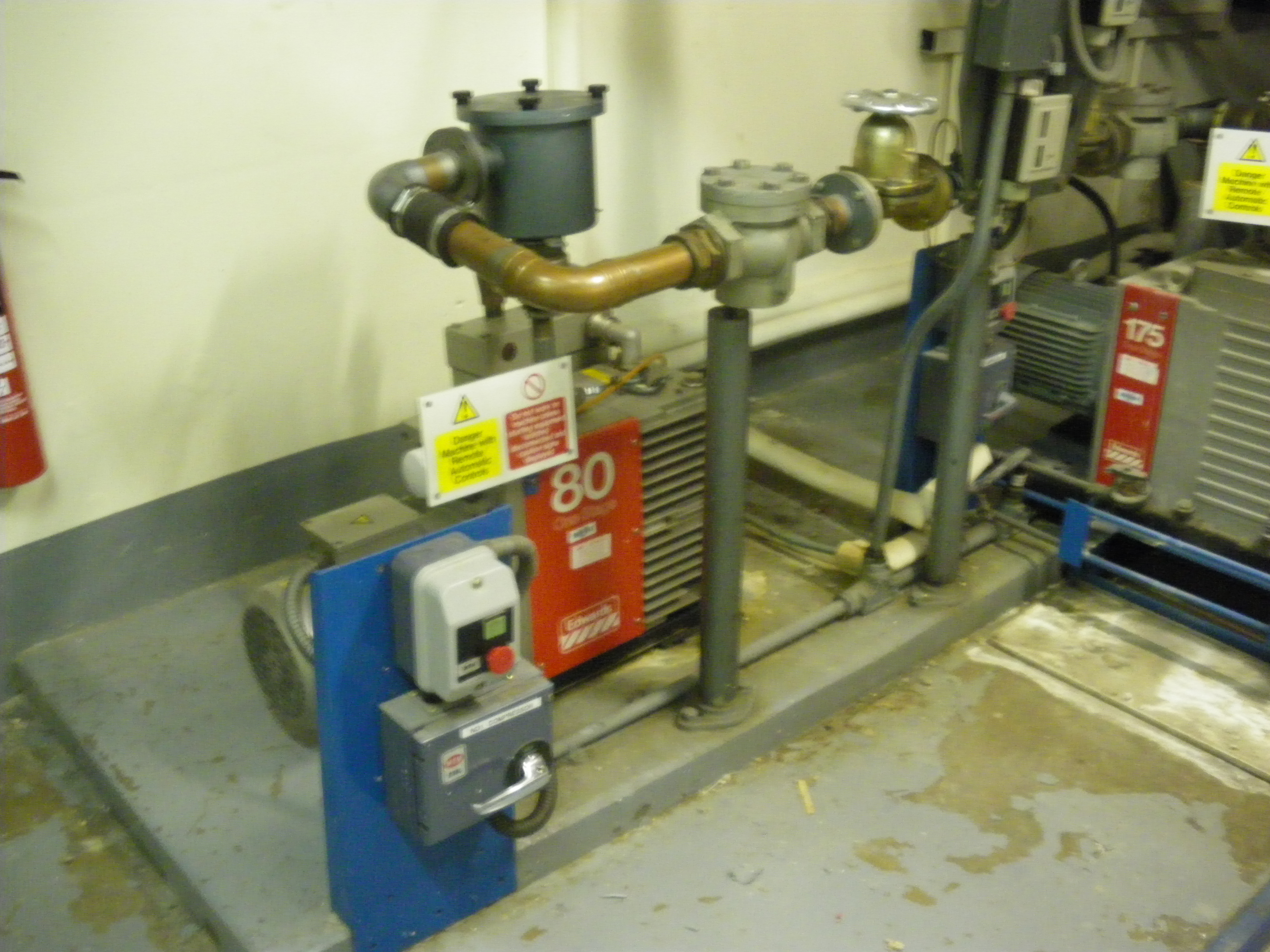 Vacuum pumps in B Core sprinkler pump room