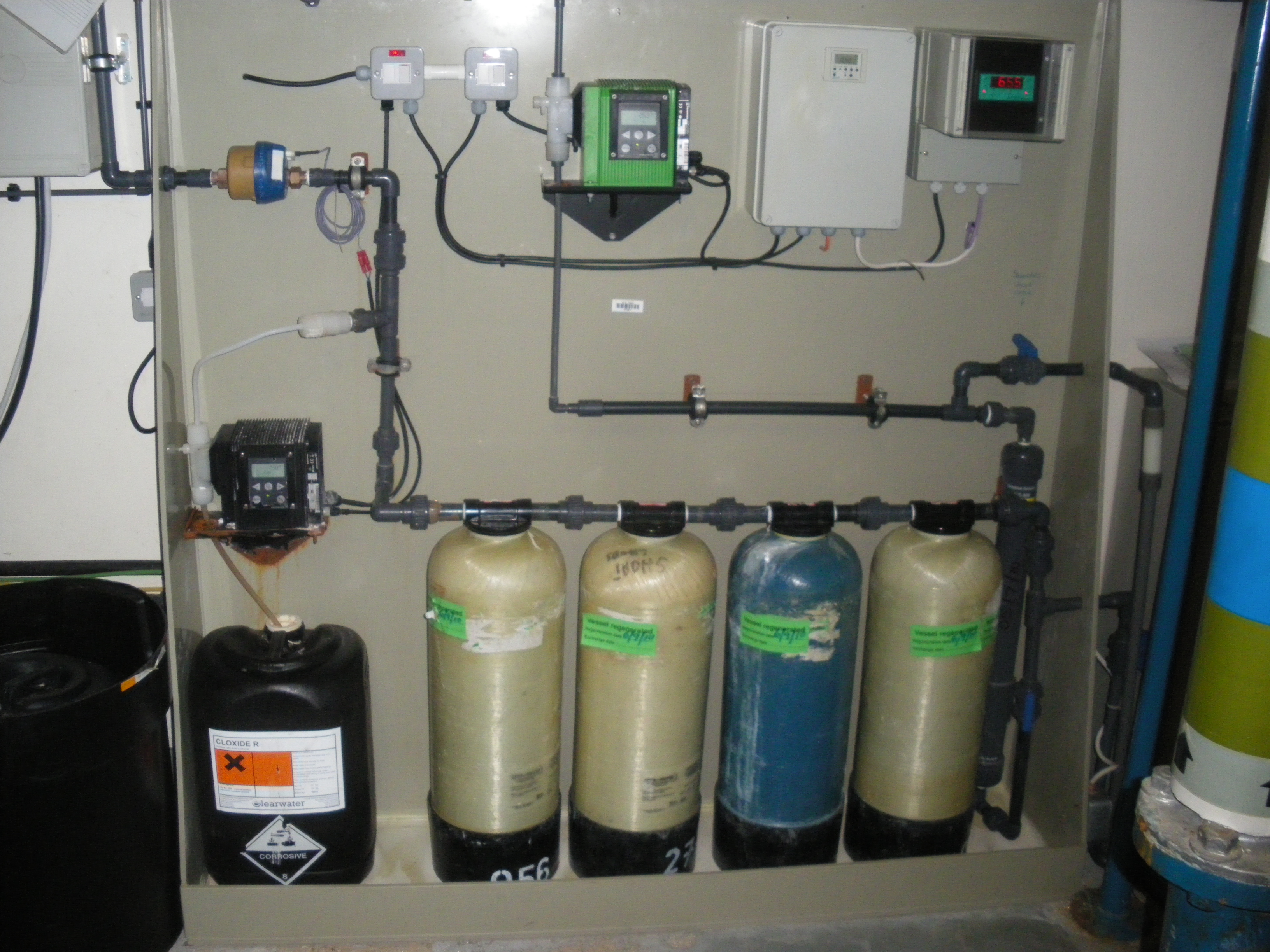 Mains water booster pump water softening system