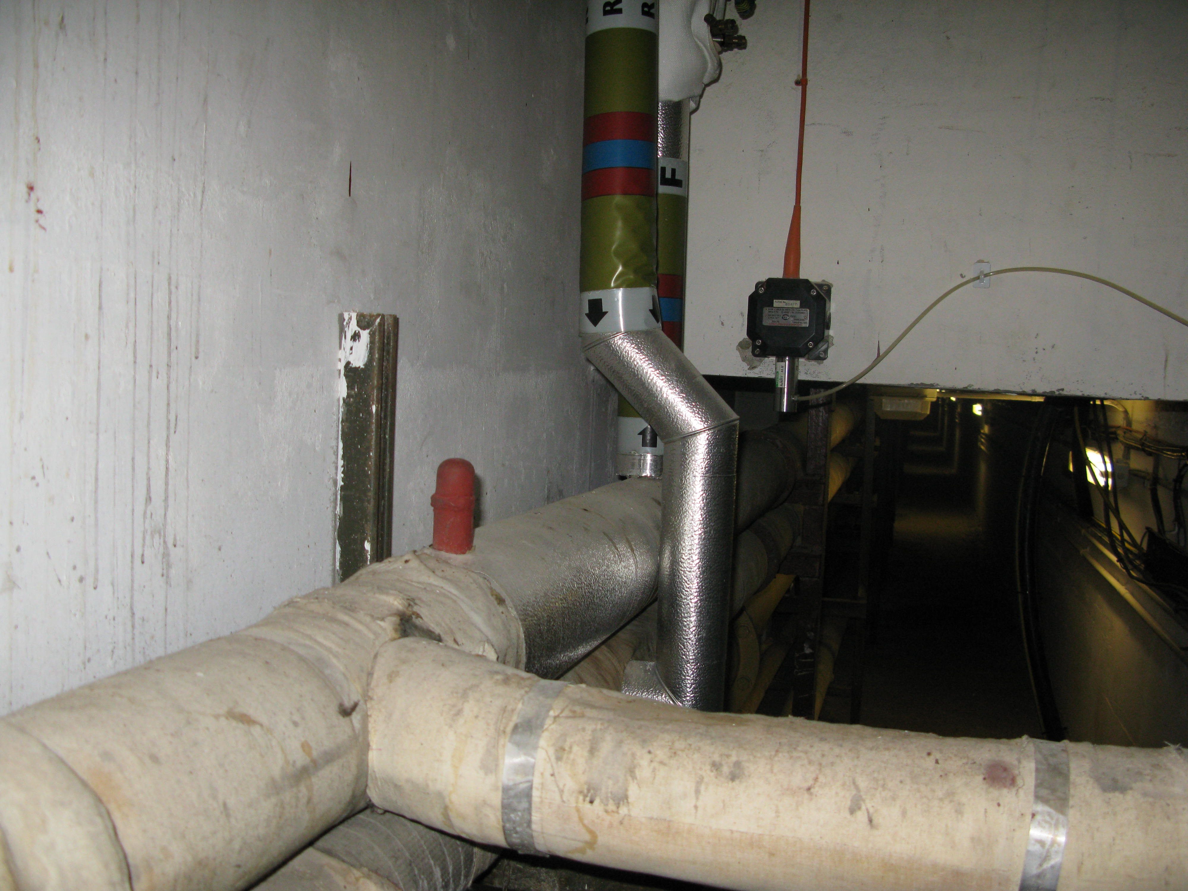Heating pipes from underground duct to E core