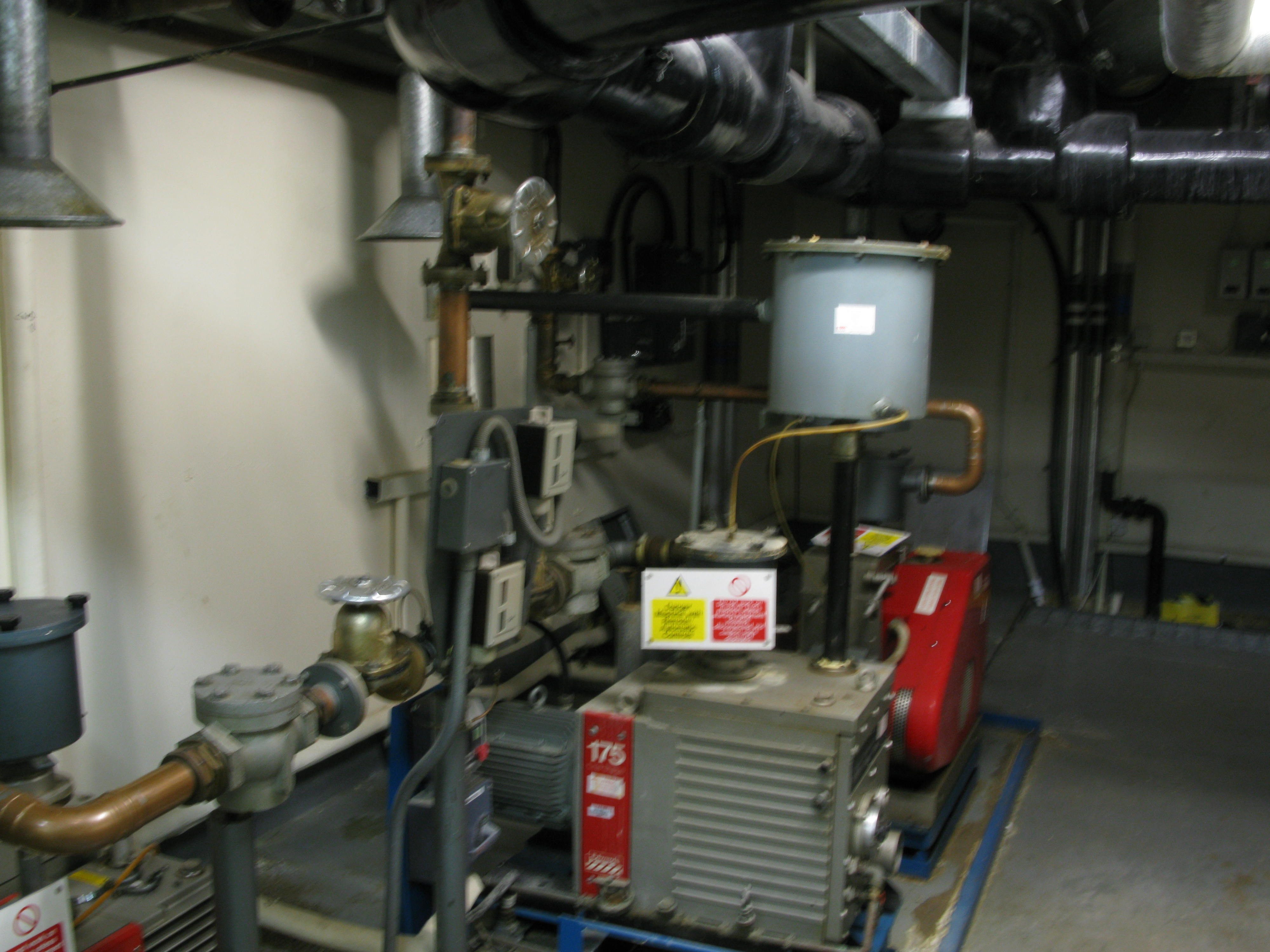 Vacuum pumps in B Core sprinkler pump room