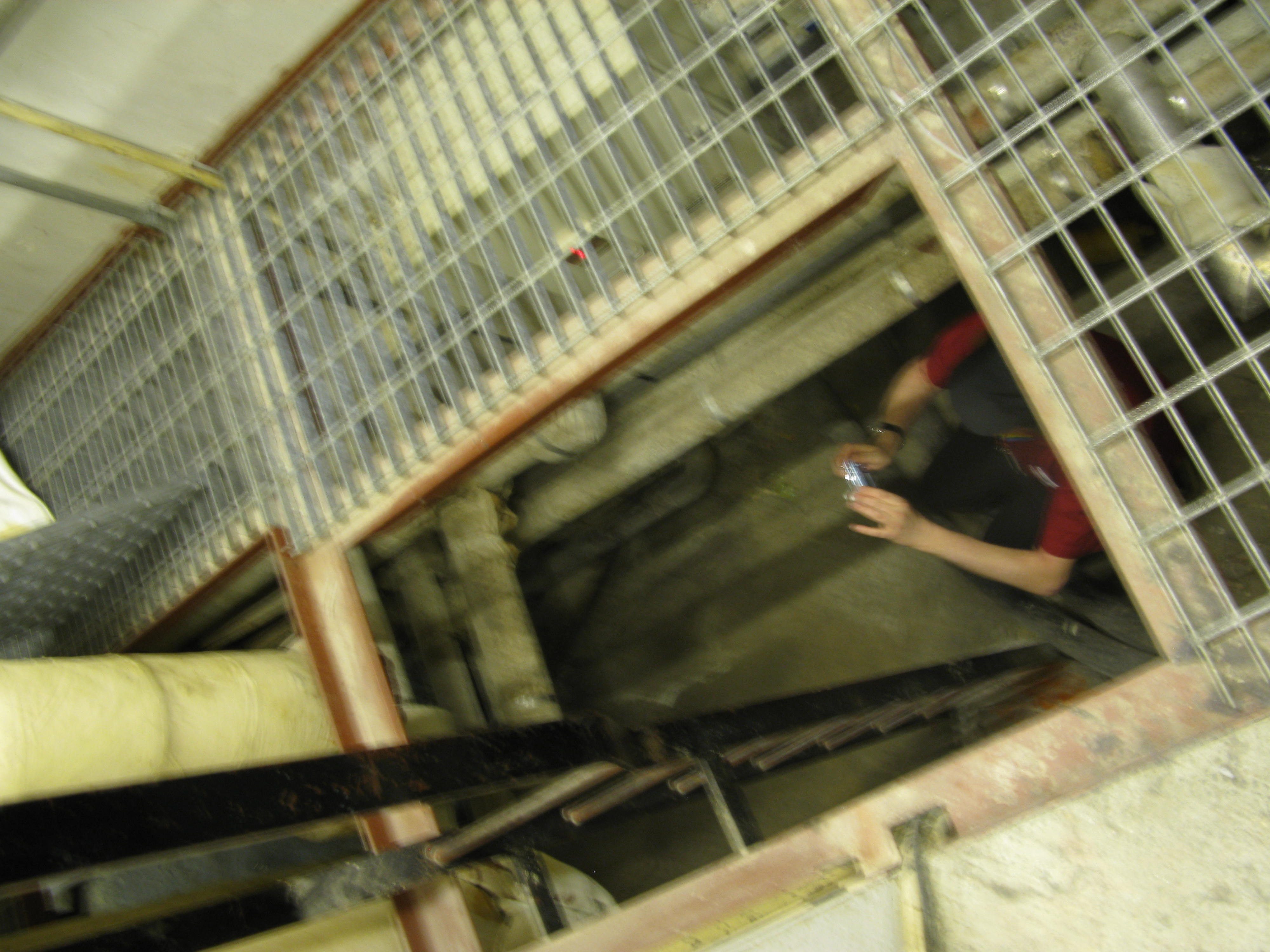Gary Tull taking photos of the duct below H core