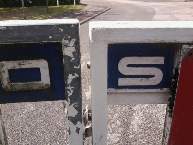 Close-up of OS letters on Wimpson Lane gate, 16 Jul 2011