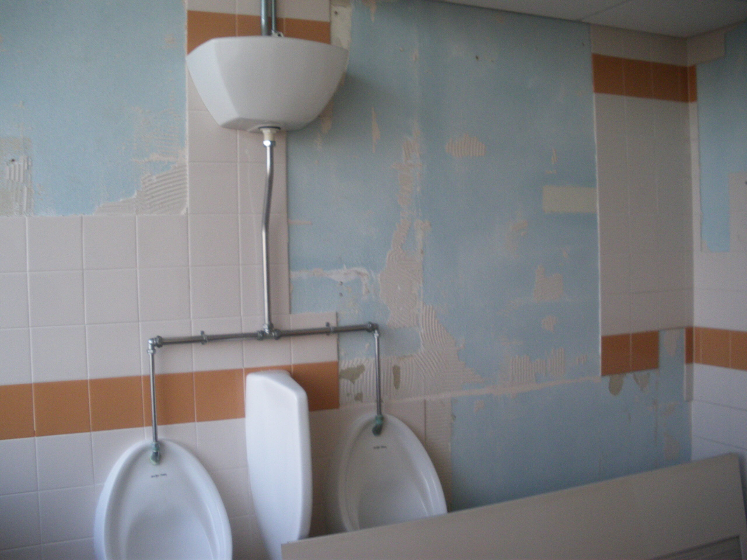 One of the gents' WCs with damaged tiles, 13 Sep 2011