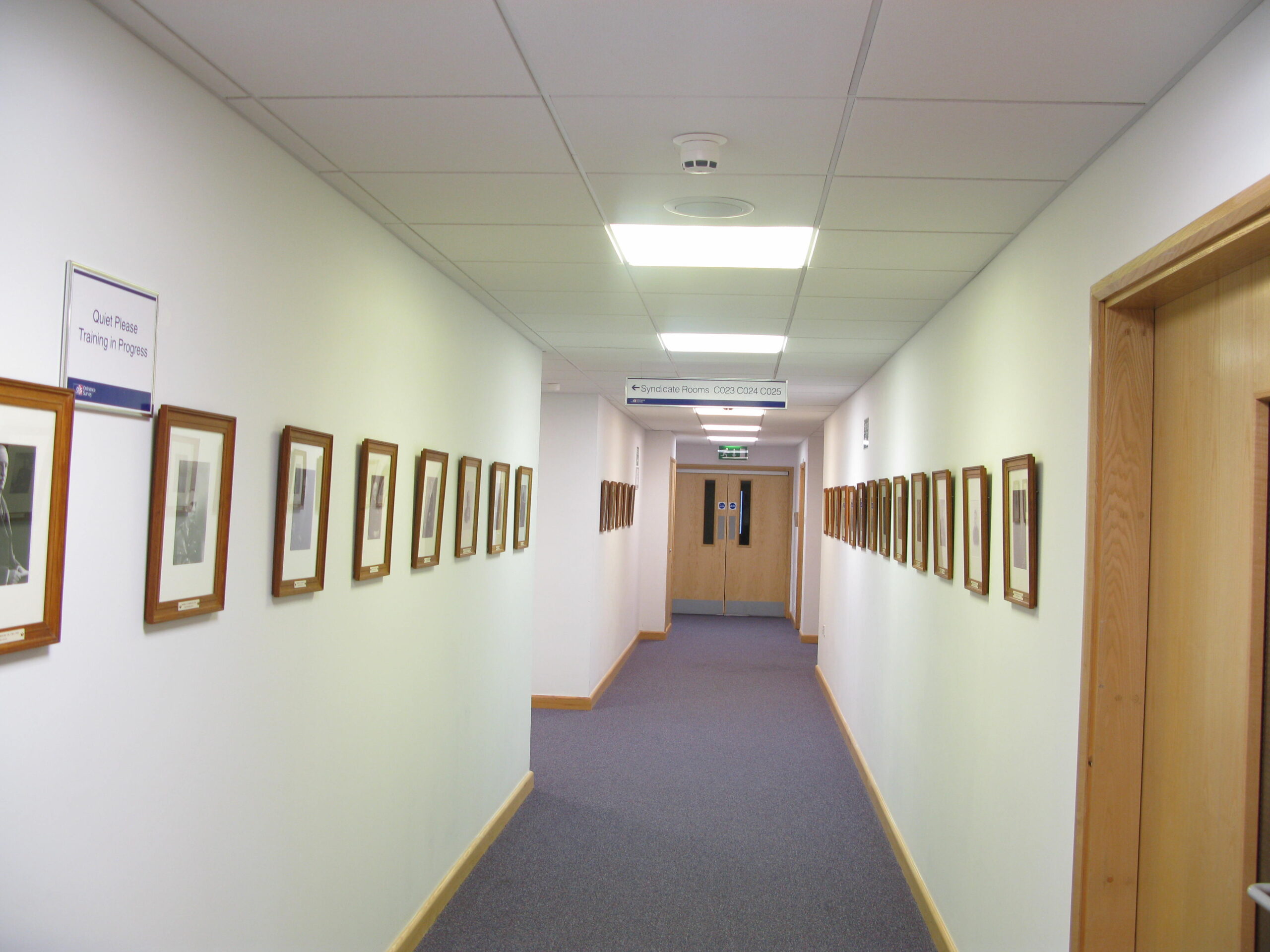 The famous DGs (Director Generals) corridor, with a photo of every DG, behind the Map Shop.